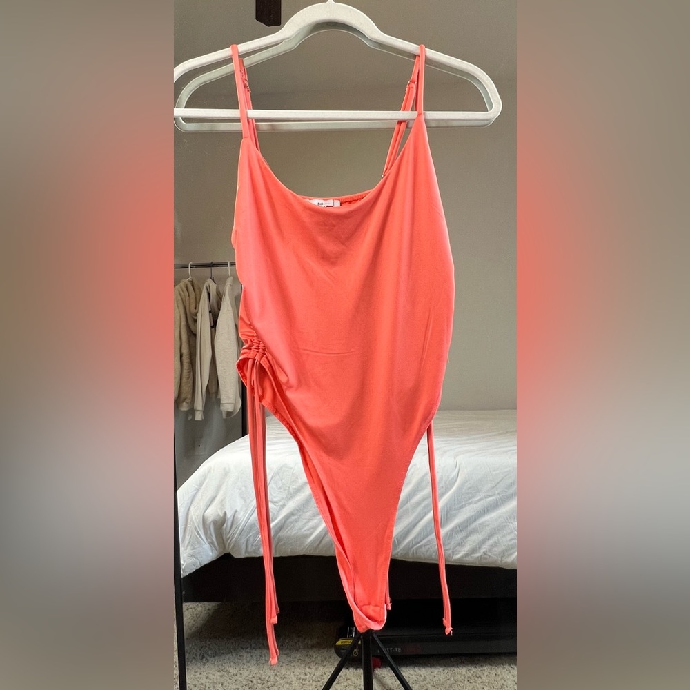 Peach color bodysuit